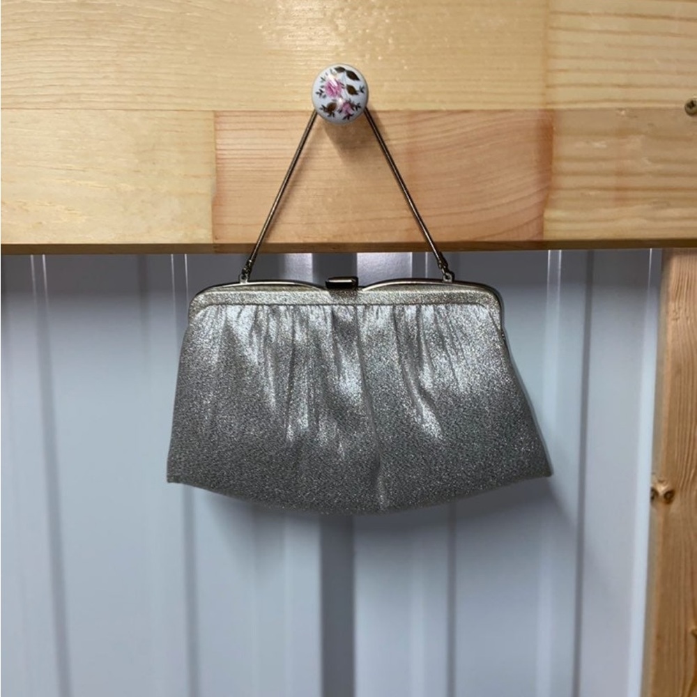 1960’s Unique Vintage Shimmering Silver Clutch with satiny two compartment inter